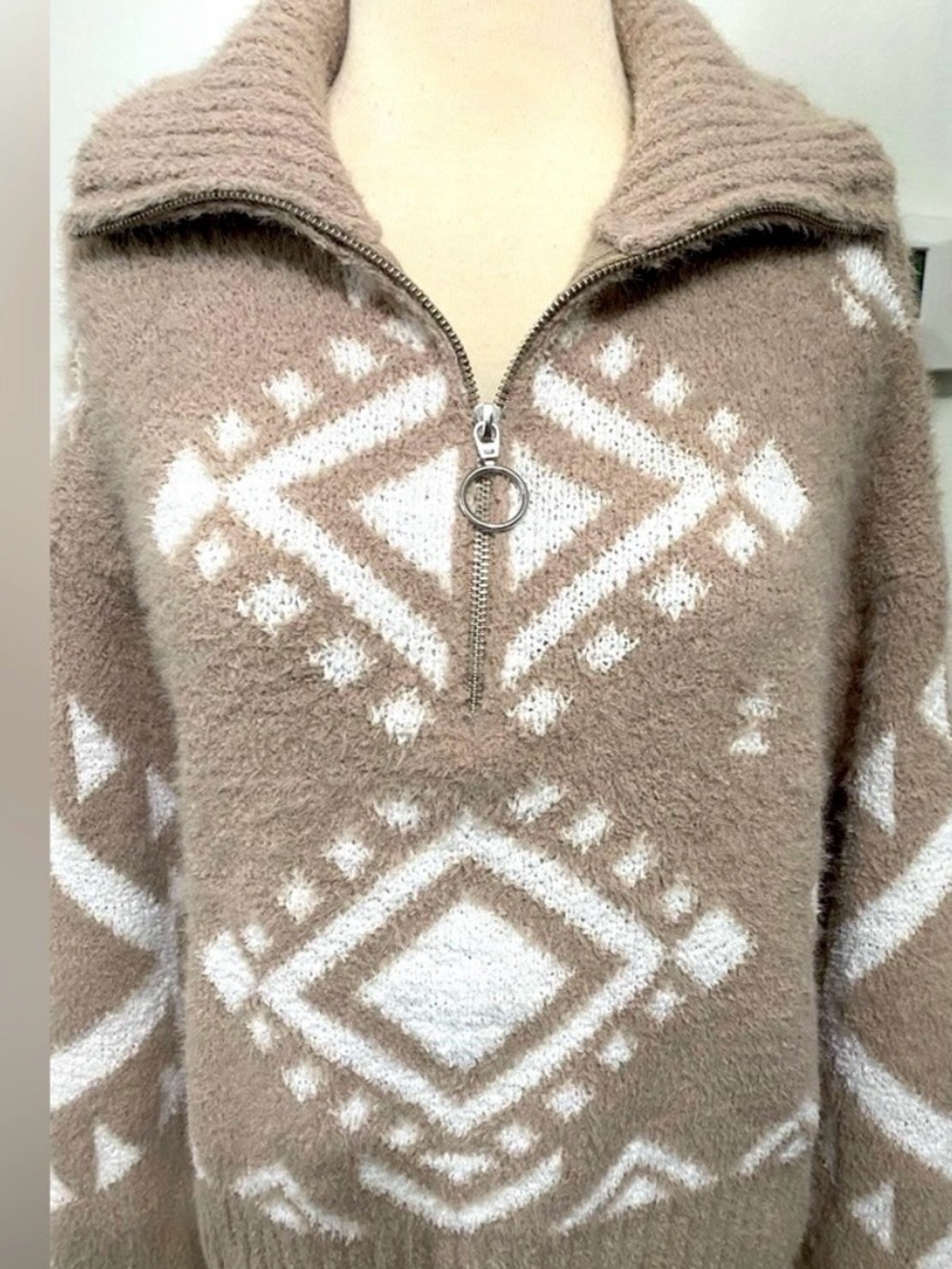 Jessica Simpson tan and white Aztec-patterned fuzzy quarter-zip sweater
